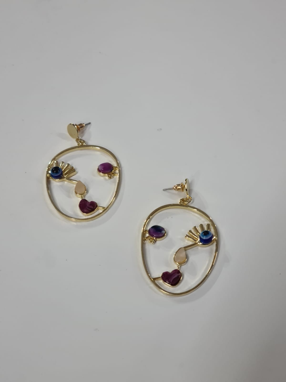 PENDIENTE CARA CON OJO HORUS